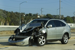 silver car that has been in an accident
